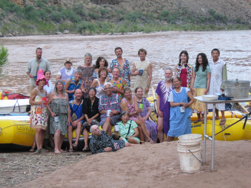 Goofy group photo from "dressing up for dinner" night.  Susan is in purple, front row, mid-right.  Terran is taking the picture.