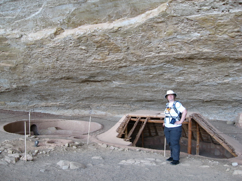 Reconstructed pit houses next to Step House